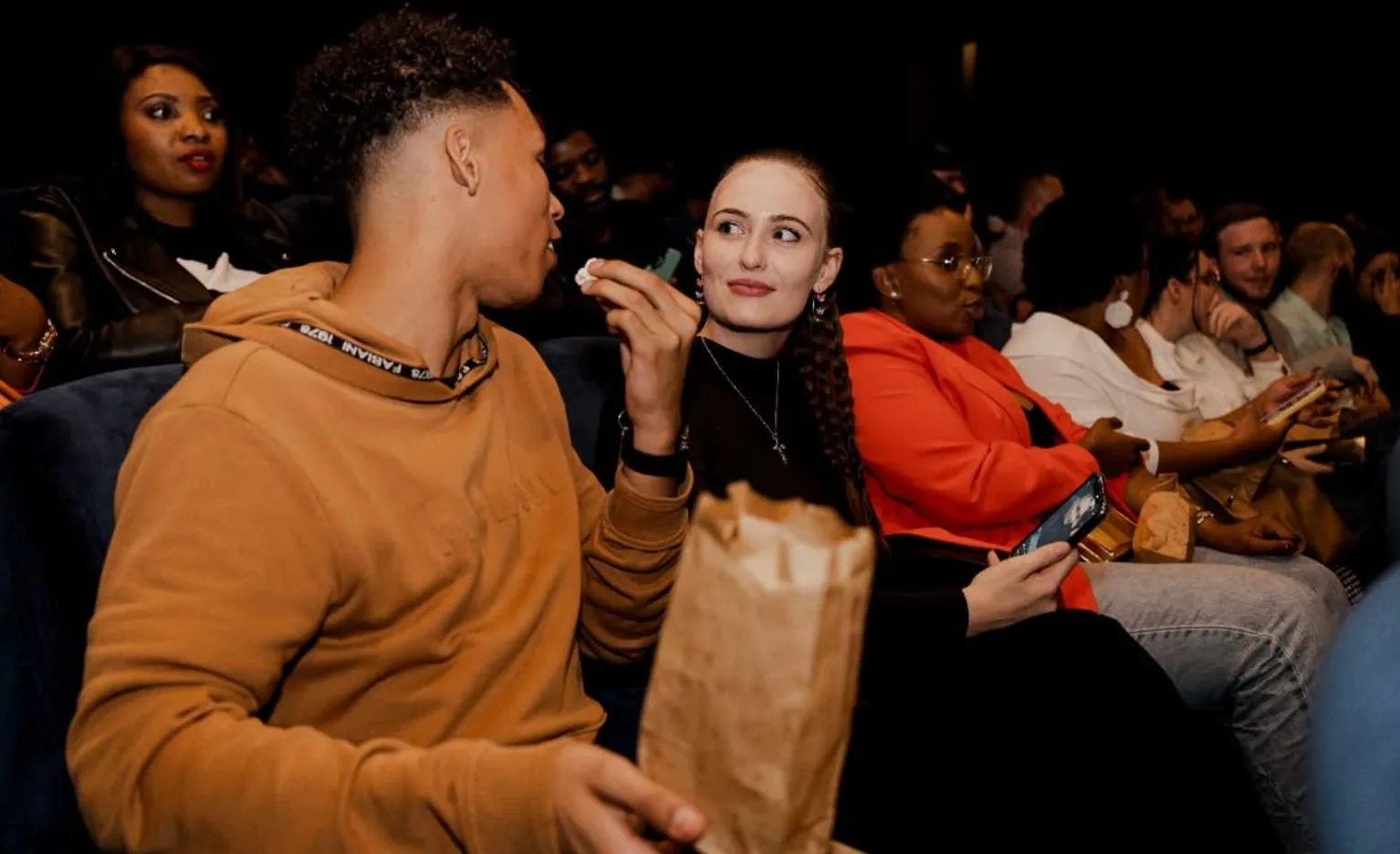 An audience watching a screening at BlackBrick