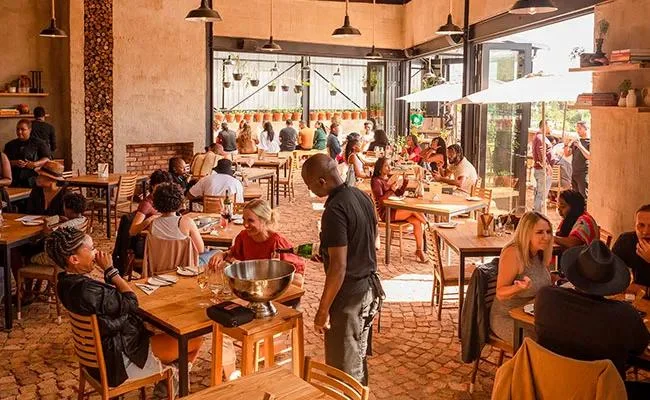 Guests sharing a meal together at a BlackBrick restaurant