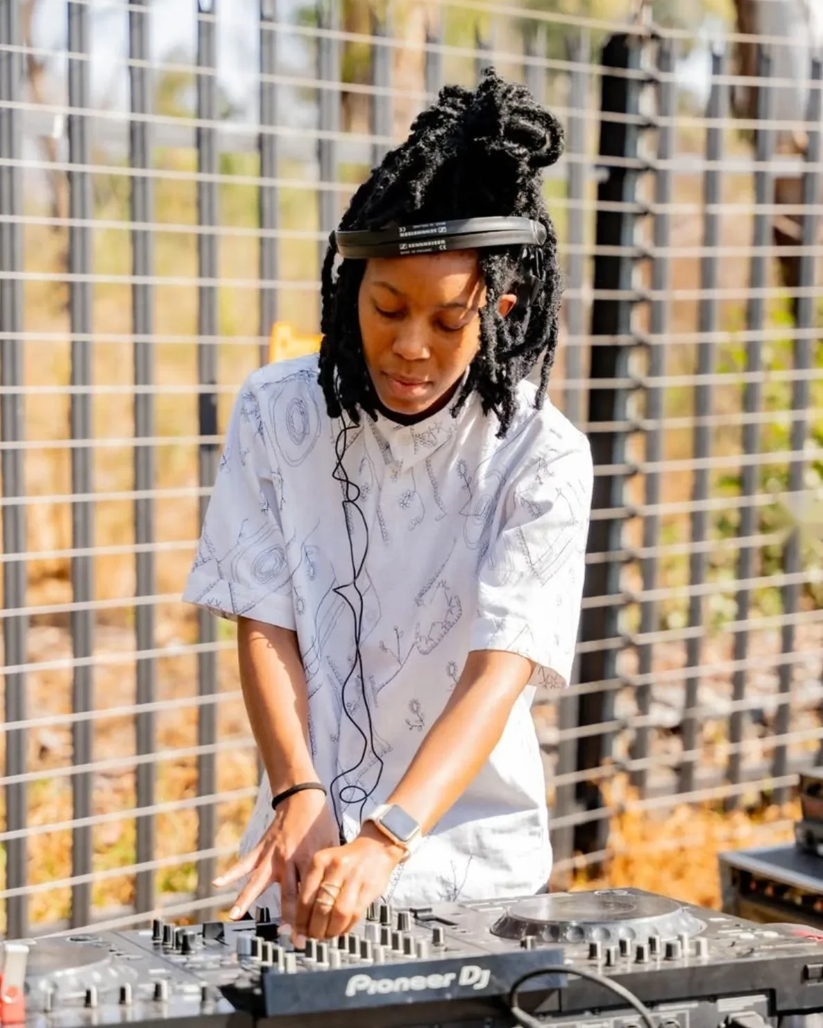 A woman DJ playing a set at a BlackBrick event