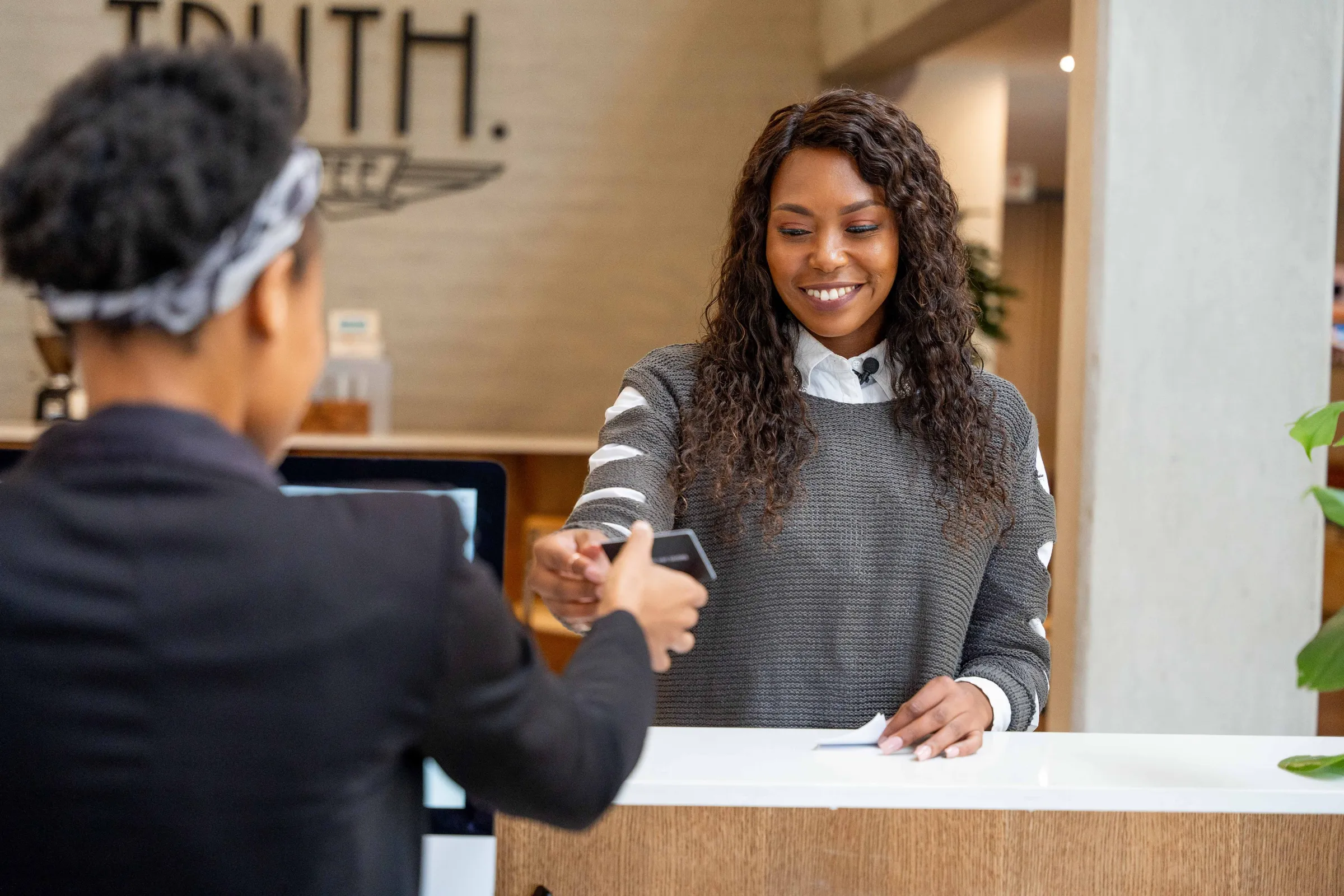 A guest being welcomed at a BlackBrick reception