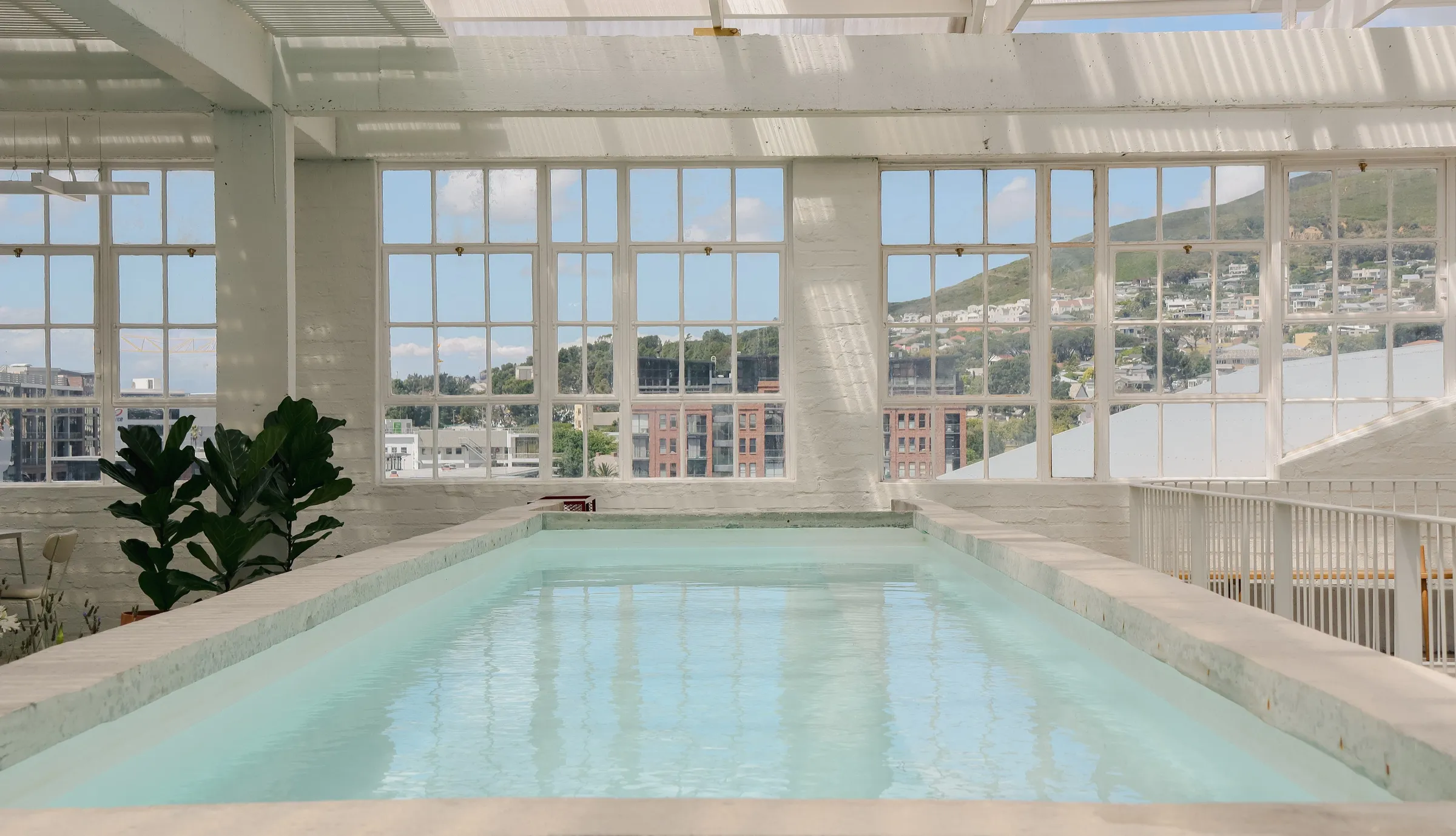 A BlackBrick pool with the mountain behind