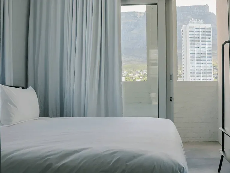 Bedroom with city views at BlackBrick Gardens